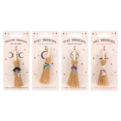 Set of 24 Lucky Crystal Broomstick Car Charms on Display